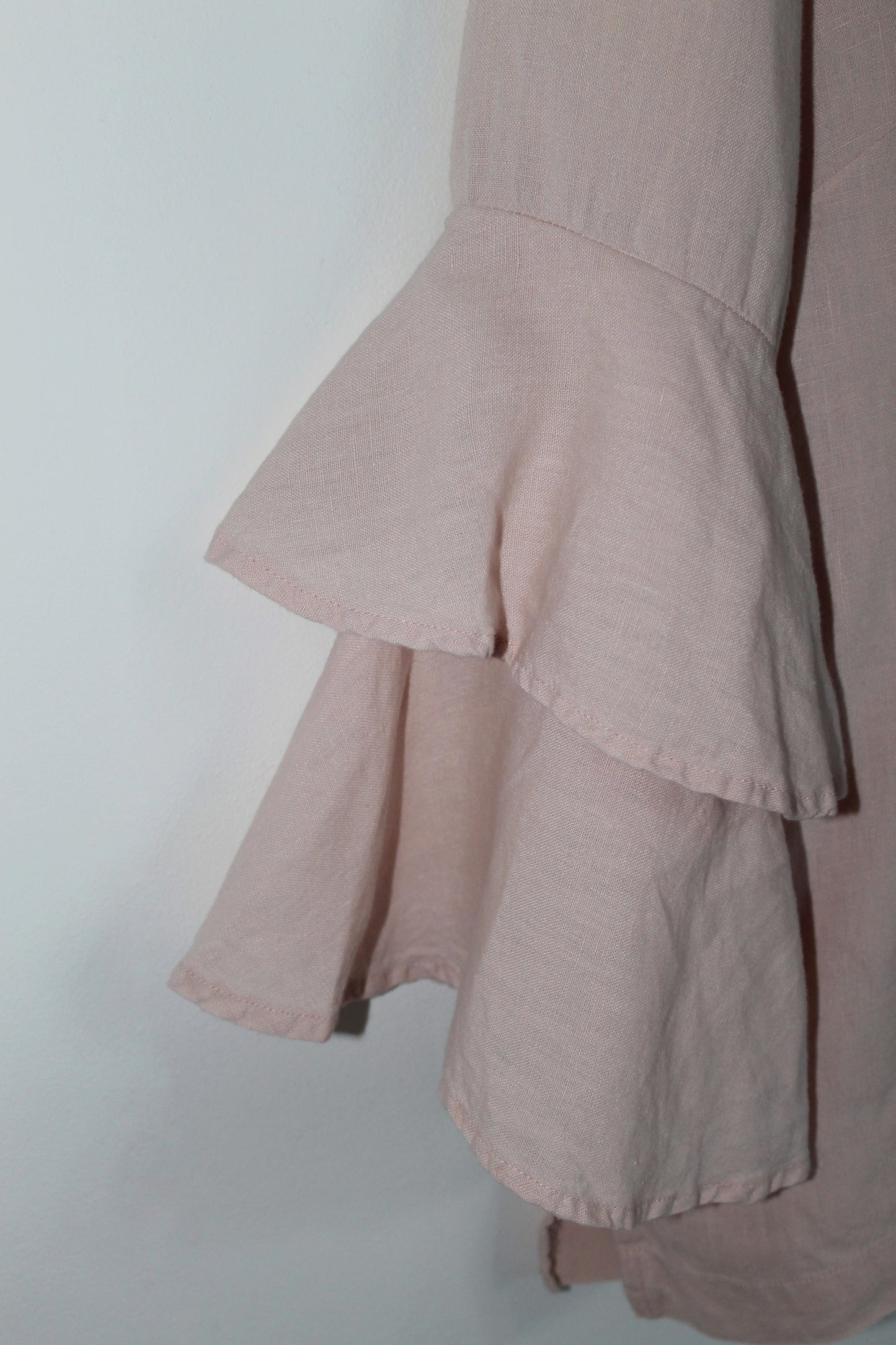 Celina Blouse - VOLIÀ. VOLIÀ Atelier - exclusively pre-loved. Each piece is pre-loved and curated with care from around the world, ready to be loved by its new owner. Celina Blouse - VOLIÀ. Discover curated, high-quality designs for the modern woman. Shop sustainable fashion at VOLIÀ Atelier today. Detailed ruffled sleeve.