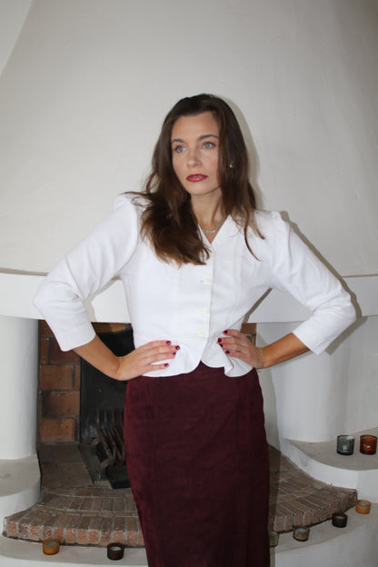 Our Elsa skirt comes in burgundy and is the perfect midi skirt for fall. This suede skirt is perfect for any occasion and offers a perfectly blended style of trendy and classic.