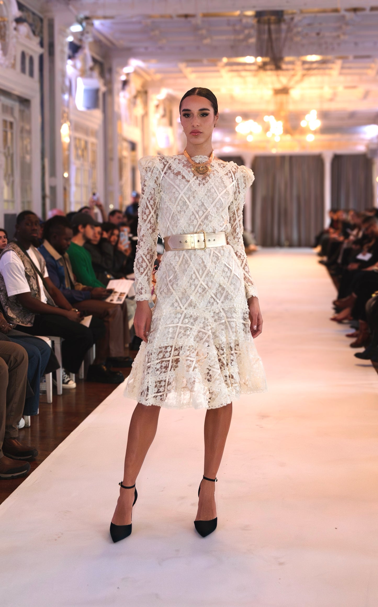 VOLIÀ Atelier - the ambre dress on the parisian runway, styled with a wide belt and large necklace