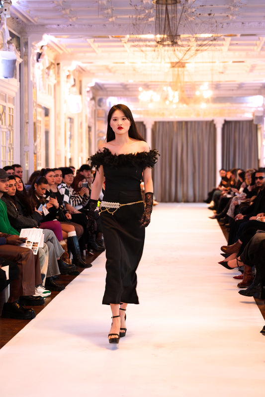 VOLIÀ Atelier - exclusively pre-loved. The perfect black VOLIÀ look seen on Paris Runway at a Parisian fashion show. Each piece is pre-loved and curated with care from around the world, ready to be loved by its new owner.  Discover curated, high-quality designs for the modern woman. Shop sustainable fashion at VOLIÀ Atelier today.